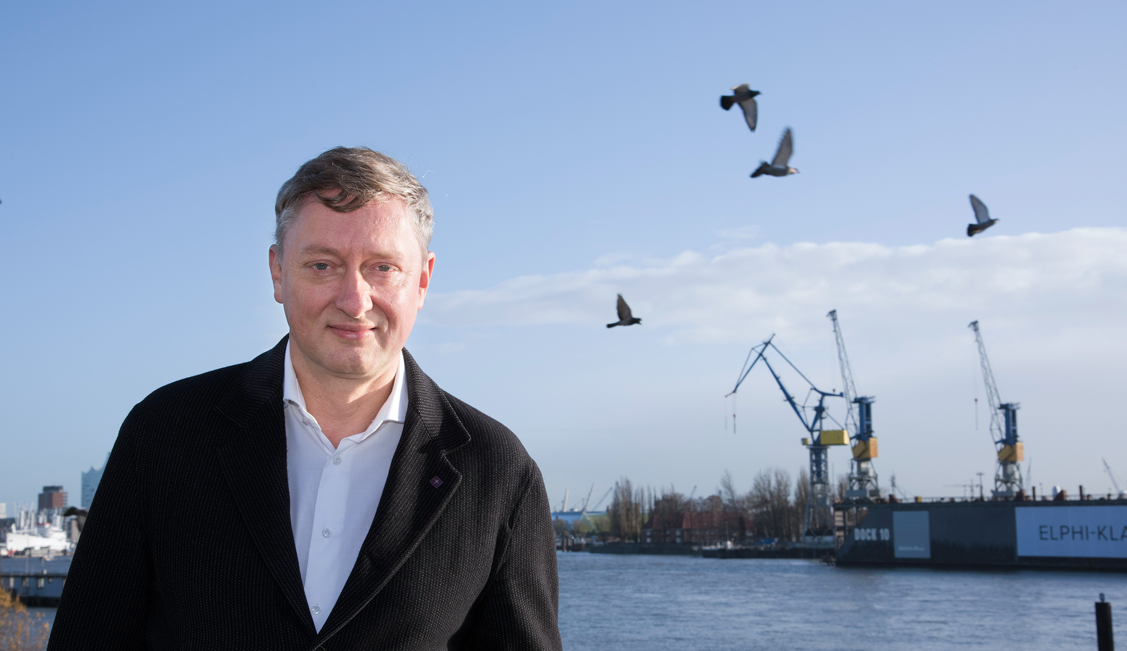 Pastor Willms der St.Pauli Kirche lächelt in die Kamera